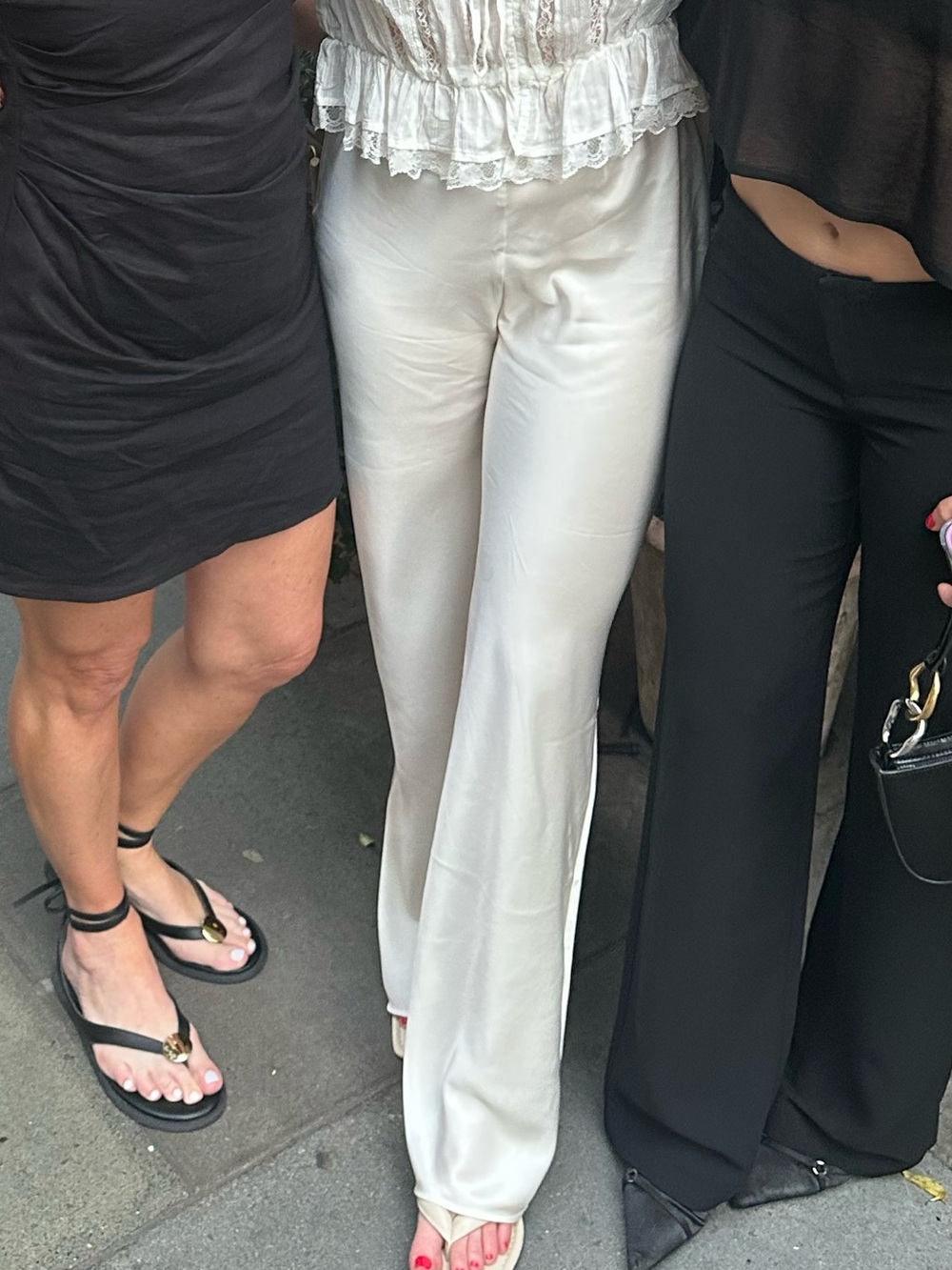 Cream reformation silk trousers